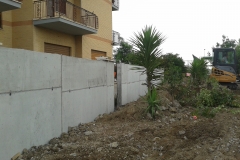 5 Demolizione e ricostruzione muro di confine in c.a.