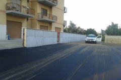 8 Demolizione e ricostruzione muro di confine in c.a.