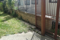2 Demolizione e ricostruzione muro di confine in c.a.